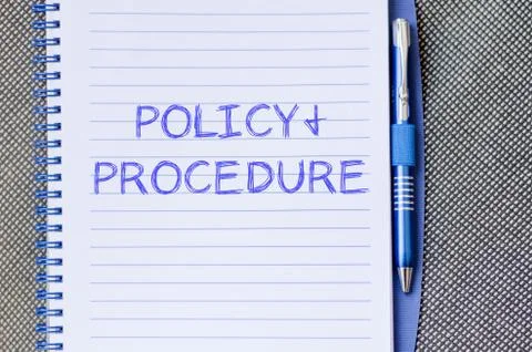 Policy and procedure write on notebook Stock Photos