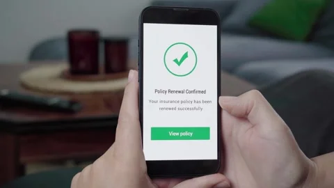 Policy Renewal Confirmed Notification on Digital Insurance App Stock Footage 343972543