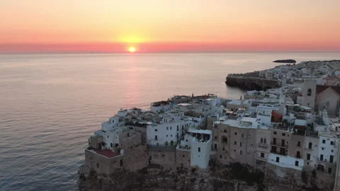 Polignano a mare aerial view drone at sunrise puglia Stock Footage 306064645