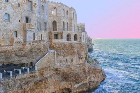 Polignano a mare: windows on the rocks Stock Photos