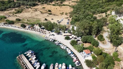 Polis beach, Ithaca, Greek Islands - drone flyover revealing bay Stock Footage 345040010