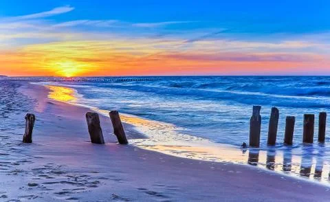 Polish beach at sunset Stock Photos