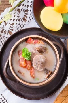 Polish Easter soup with egg and sausage Stock Photos