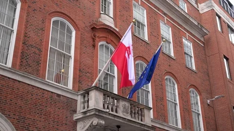 Polish Embassy Consular Section Balcony with Poland and EU Flags Stock Footage 346550432