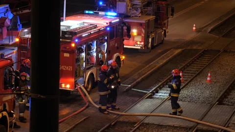 Polish fire brigade during firefighting at night. Stock Footage 93727436
