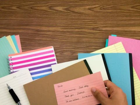 Polish; Learning New Language Writing Words on the Notebook Stock Photos