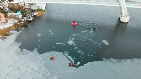 Polish Lifeguards Exercise Ice Rescue Training At Frozen Lake In Video stock 149186348