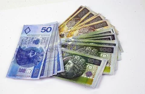 Polish money on a white background Stock Photos