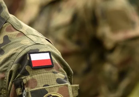 Polish patch flag on soldiers arm. Poland military uniform. Poland troops Stock Photos