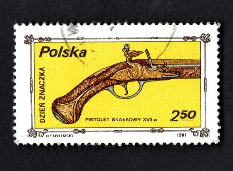 Polish post stamp about ancient pistol. Weapons on the stamp. Isolated stamp Stock Photos