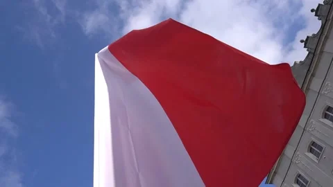 Polish red and white flag against a blue sky, state flag day on may 2 on a Sunny Stock-Footage 130255449