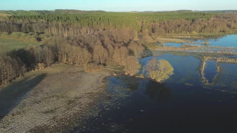 Polish River - Reverse Ascending Lateral  Flight - 4K ProRes Stock Footage 332498403