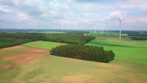 Polish spring fields with windmills. Drone video. Stock Footage 276991151