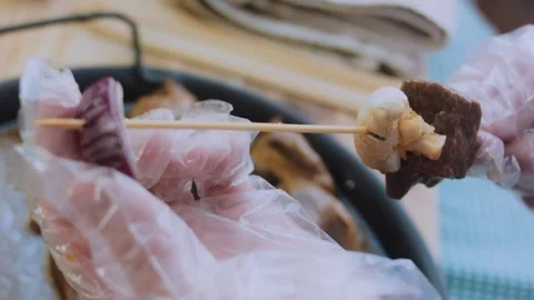 Polished appetizing arrangement: removing steak cubes from the marinade bag Stock Footage 342181744