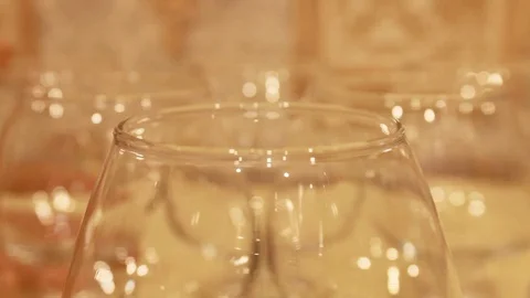 Polished cognac glasses take one by one Stock Footage 91587516
