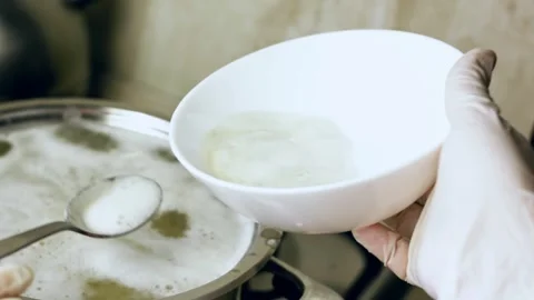 Polished creamy mashed potatoes served from a rustic clay pot in action, 4K Stock Footage 341103225