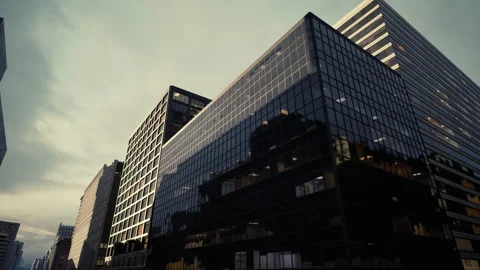 Polished glass tower reflects clouds and emphasizes structural harmony Stock Footage 334342001