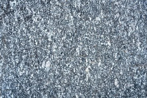 Polished grey granite stone surface texture. Stock Photos