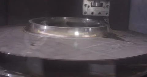 Polished Metal Disc Rotating Under a Gauge, Precision Workshop, Close Up Shot Vídeo Stock 340357006