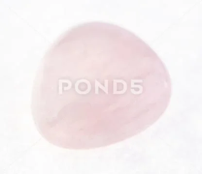 Polished pink (rose) quartz gemstone on white Stock Photos