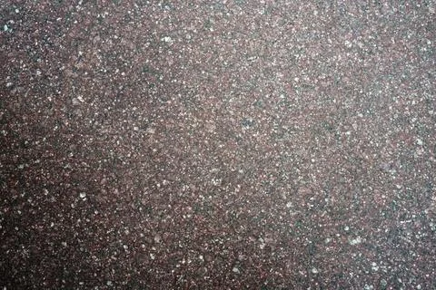 Polished red granite stone texture background Stock Photos