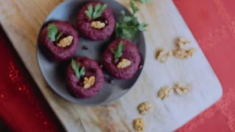 Polished serving detail: capturing walnut and beet texture Stock Footage 342200508