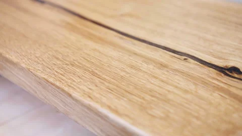 Polished wood texture of natural pattern, close up shot of light brown wood Video stock 266172591