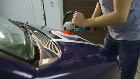Polishing blue car with reflection, the concept car care Stock Footage 71338937