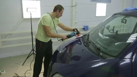 Polishing blue car with reflection, the concept car care Stock-Footage 71339116