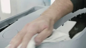 Polishing a car bumper Stock Footage 85899089