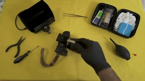 Polishing the front element of a wide-angle lens. Stock Footage 327624244