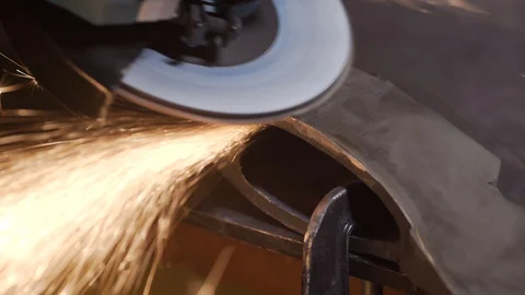 Polishing grinder of the surface of the axe Stock Footage 129040065