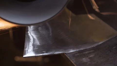 Polishing grinder of the surface of the axe Stock Footage 129040093