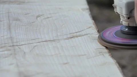 Polishing wood. Processing of logs using a grinding machine. Carpentry work Stock Footage 244673008