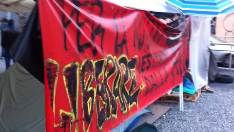 Political Demonstration Protest of foreignes immigrant in Milan, Italy 動画素材 92853381