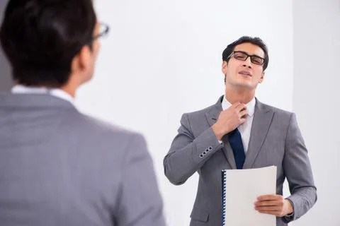 Politician planning speach in front of mirror Stock Photos