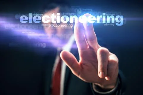 Politician pushing virtual screen interface with word Electioneering Stock Photos