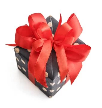 Polka dot Gift box with red ribbon Stock Photos