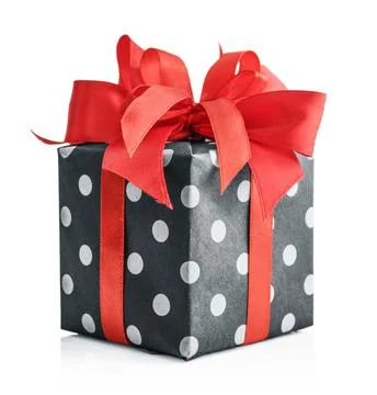 Polka dot Gift box with red ribbon Stock Photos