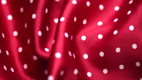 Polka dots red satin background, red with white silk backdrop. Closeup view Stock Footage 342845281