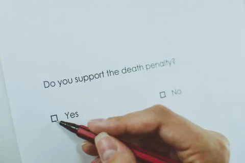 Poll question: Do you support the death penalty? Answer: Yes. Closeup Foto stock