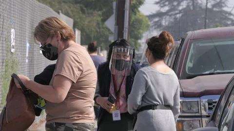 Poll Workers With Masks Guide Votes On Election Day 2020 Stock Footage 142523586