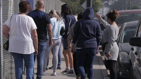 Poll Workers With Masks Guide Votes On Election Day 2020 Stock Footage 142524026