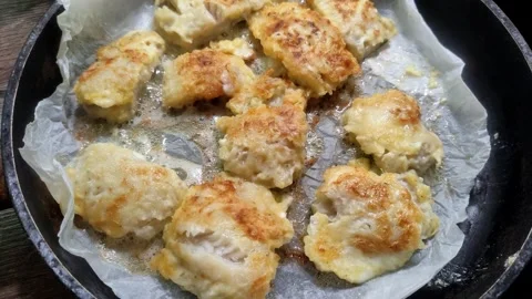 Pollock fish fried in a frying pan Stock Footage 266990571