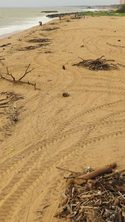 Polluted beach after a storm. Negombo, Sri Lanka. 動画素材 342510795