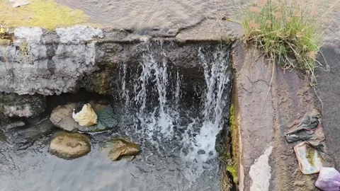 Polluted Drain Waterfall With Plastic Waste in Stream Видео 330326048