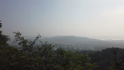 Polluted landscape in nature on mountain with big city, Hangzhou, China Stock Footage 165529092