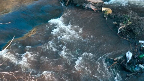Polluted Mountain River with Plastic Trash and Toxic Garbage Stock Footage 123580179