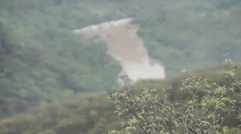 Polluted river at the bottom of the canyon Stock Footage 36707086