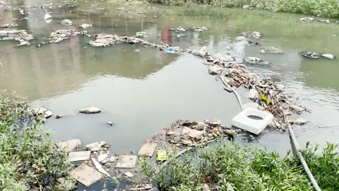 Polluted River with Floating Garbage and Plastic Waste Environmental Pollution Vídeo Stock 196062506